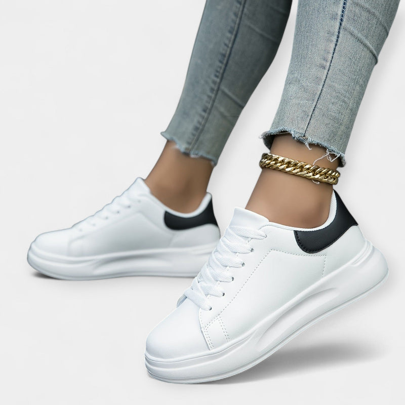 Eva Eleganti Minimalistiset Kaupunkijuoksukengät" could be rewritten as "Eva Eleganti Minimalist Urban Running Shoes.