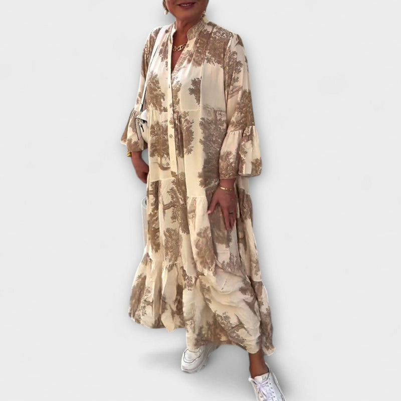 Nerina - Tyylikkäät kukkakuosiset maksimekot" could be rewritten as "Nerina - Elegant Flower-Patterned Maxi Dresses.
