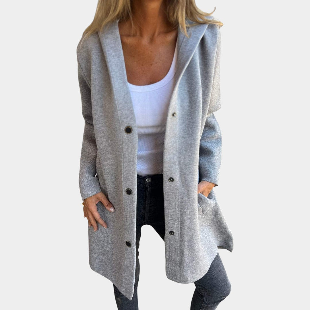 Karolīna - Mukava Takki" can be rewritten as "Karolīna - Comfortable Jacket.