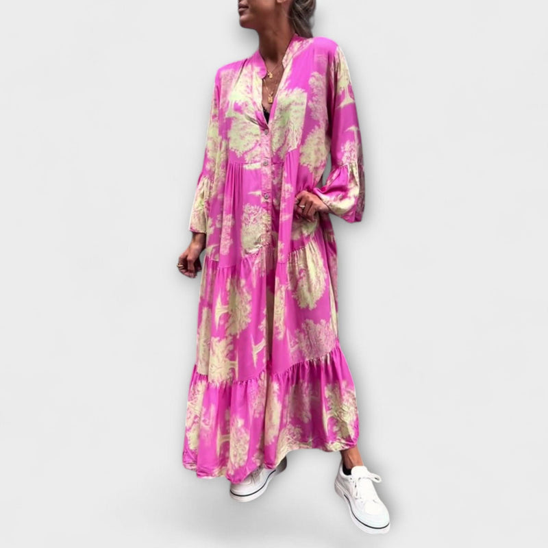 Nerina - Tyylikkäät kukkakuosiset maksimekot" could be rewritten as "Nerina - Elegant Flower-Patterned Maxi Dresses.