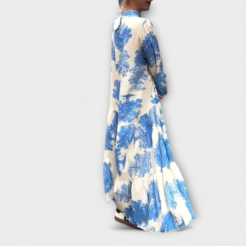 Nerina - Tyylikkäät kukkakuosiset maksimekot" could be rewritten as "Nerina - Elegant Flower-Patterned Maxi Dresses.