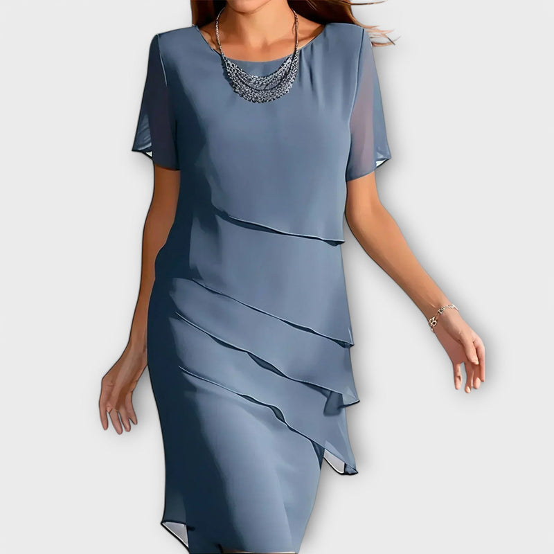 "Katharina - Tyylikkäät vartalonmyötäiset mekot" can be rewritten as "Katharina - Elegantit vartalonmyötäiset mekot".
