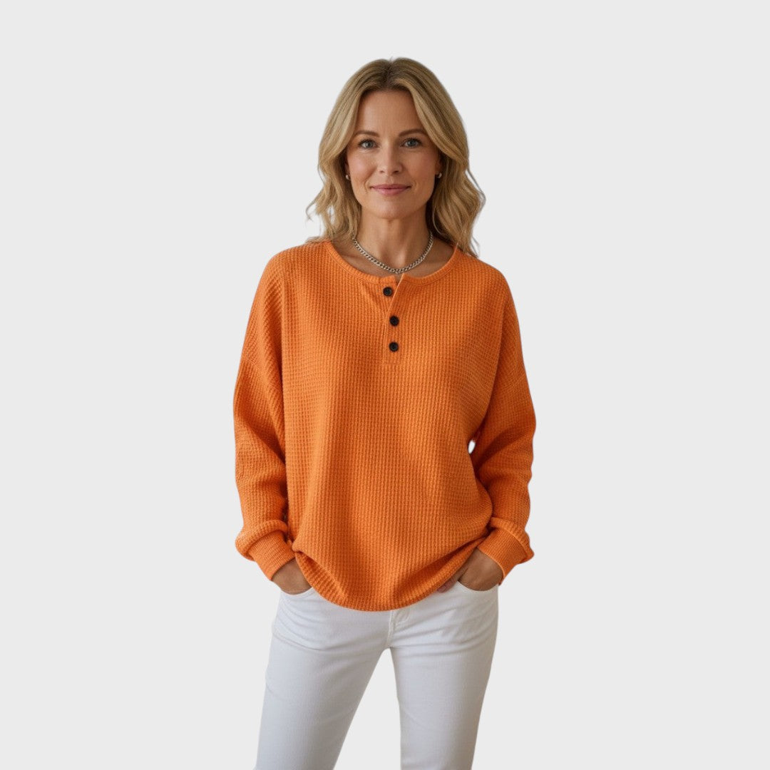 Helle | Vafli-neulepaita napilla" can be rewritten as "Helle | Button-Up Waffle Knit Sweater.