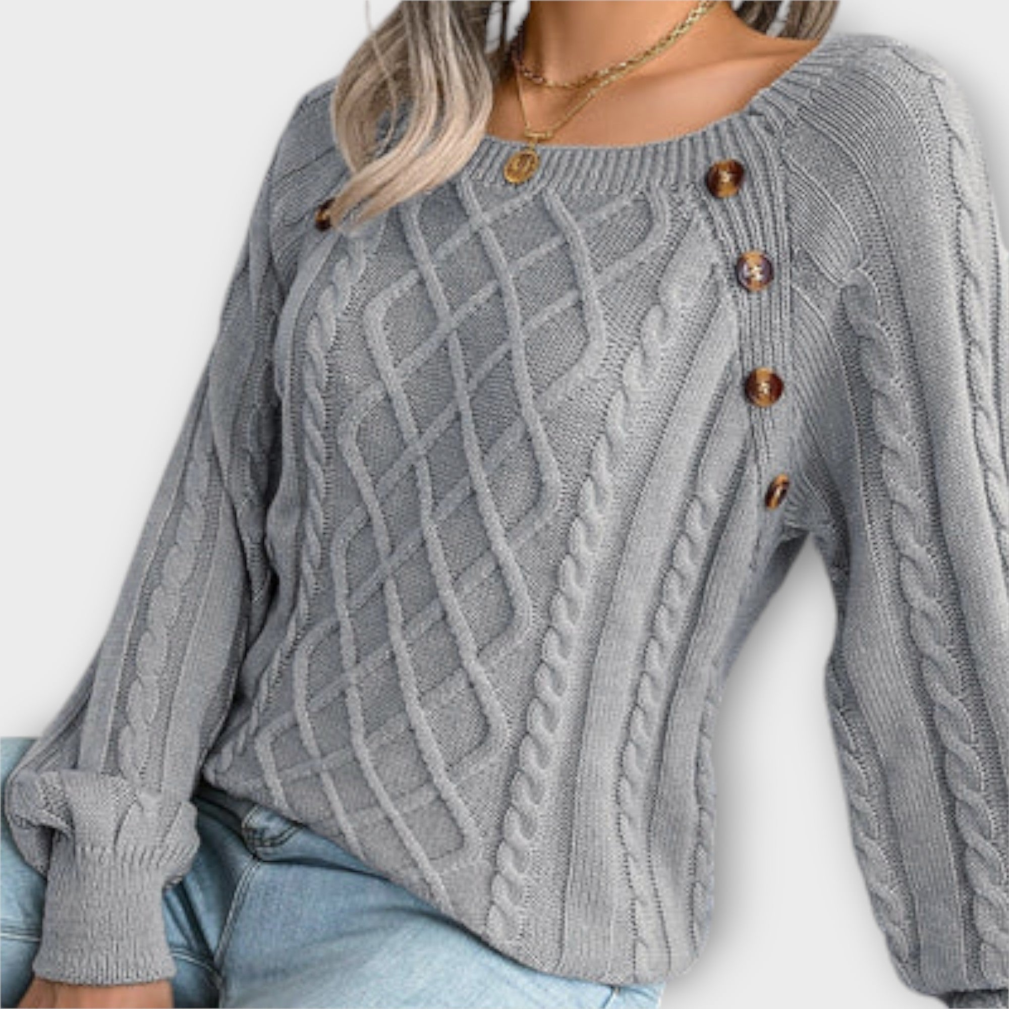 "Malia - Napillinen Neulepaita" can be rewritten as "Malia - Napillinen Neulepaita (Button-Up Knit Sweater)".