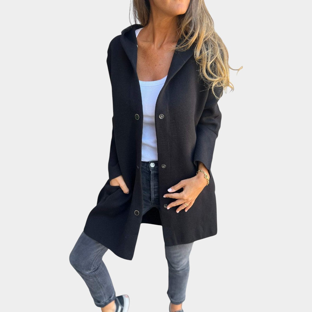 Karolīna - Mukava Takki" can be rewritten as "Karolīna - Comfortable Jacket.