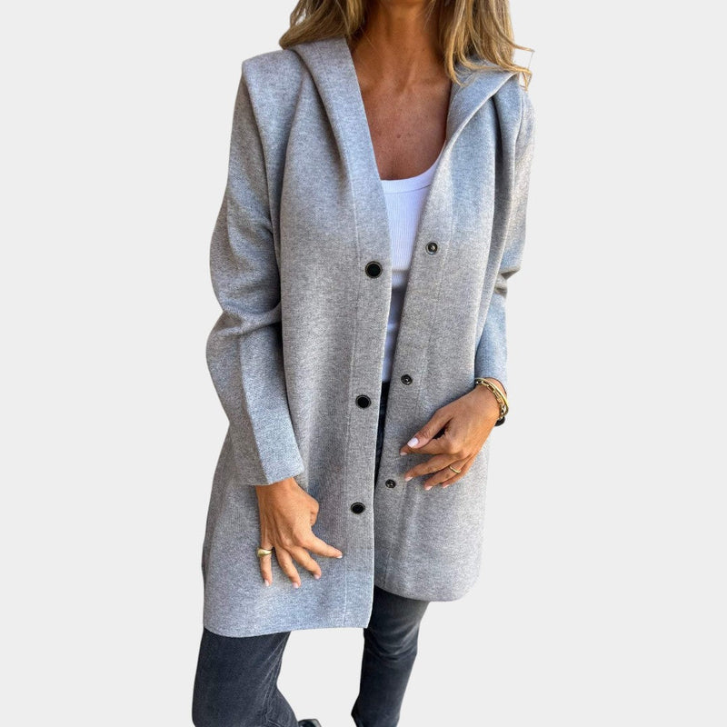 Karolīna - Mukava Takki" can be rewritten as "Karolīna - Comfortable Jacket.