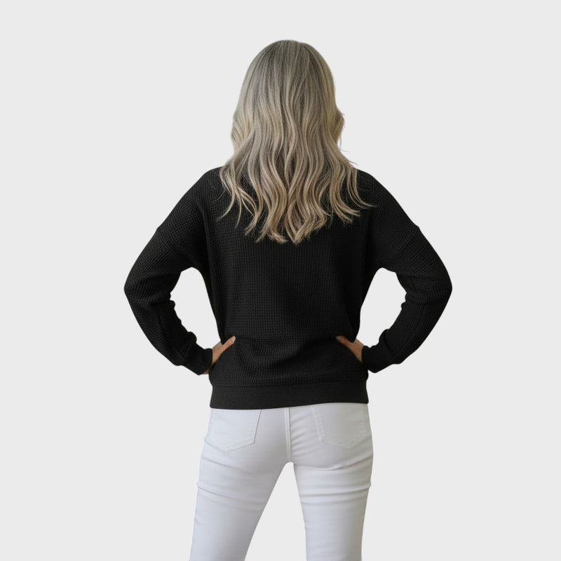 Helle | Vafli-neulepaita napilla" can be rewritten as "Helle | Button-Up Waffle Knit Sweater.